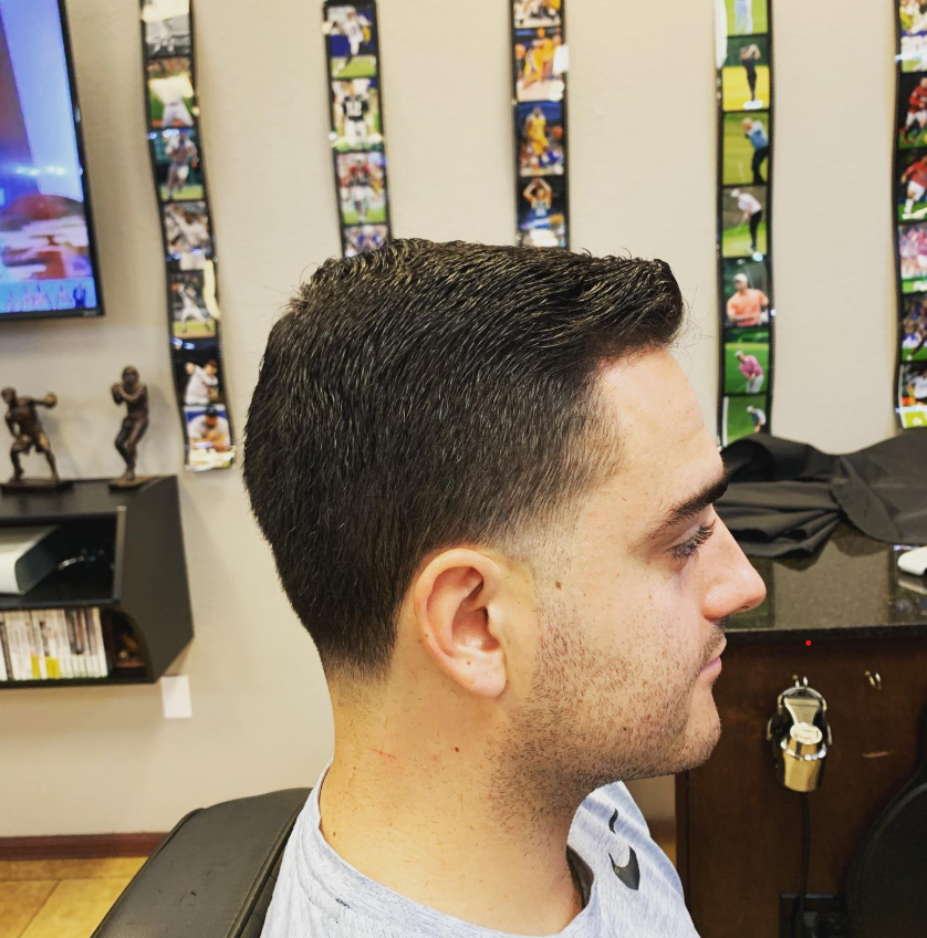 man in barbers chair